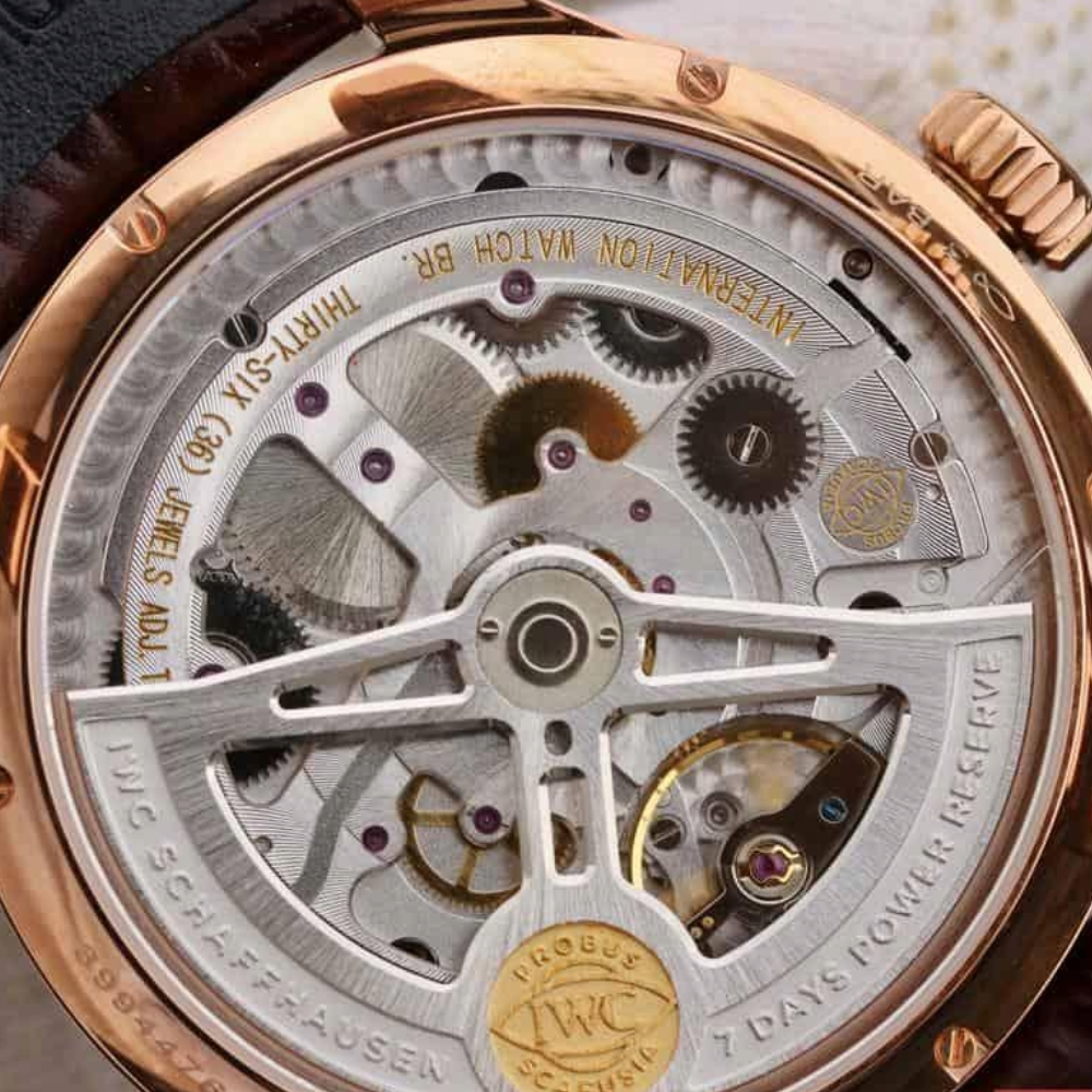 IWC 포르투기저 애뉴얼 캘린더 로즈골드 화이트 다이얼 레더 스트랩 44.2mm IW503504