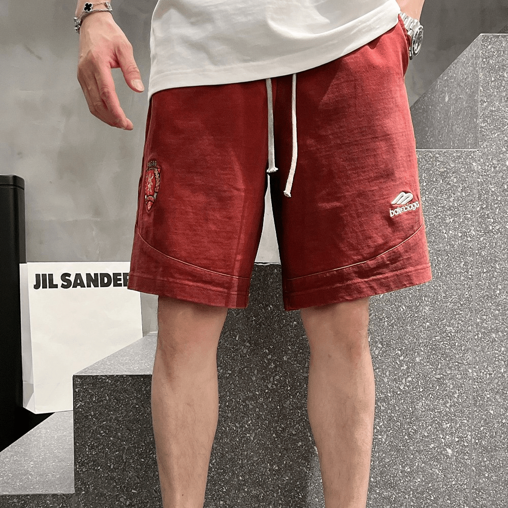 발렌시아가 24SS 스포티 자수로고 반바지 버건디